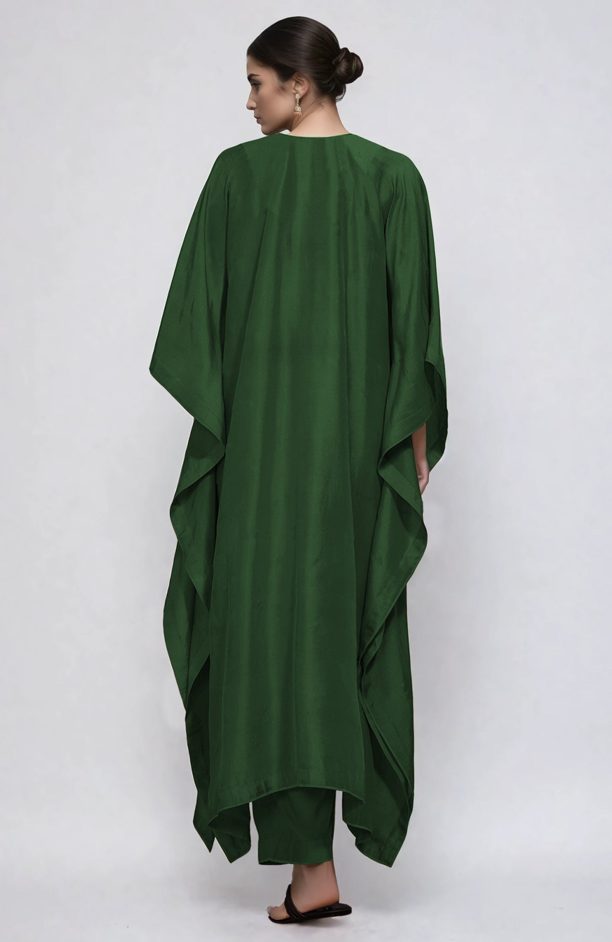 Emerald green kaftan set with silver Kashmiri Tilla embroidery on placket and cuffs, paired with straight pants