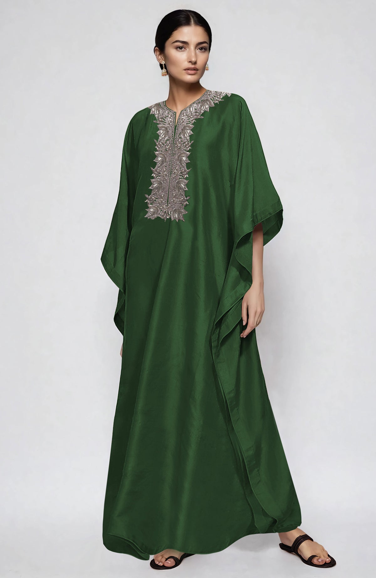 Emerald green kaftan with intricate silver Kashmiri Tilla embroidery on placket and cuffs