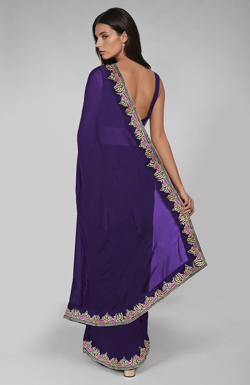Indigo purple saree with Kashmiri tilla and resham embroidered paisley motifs.