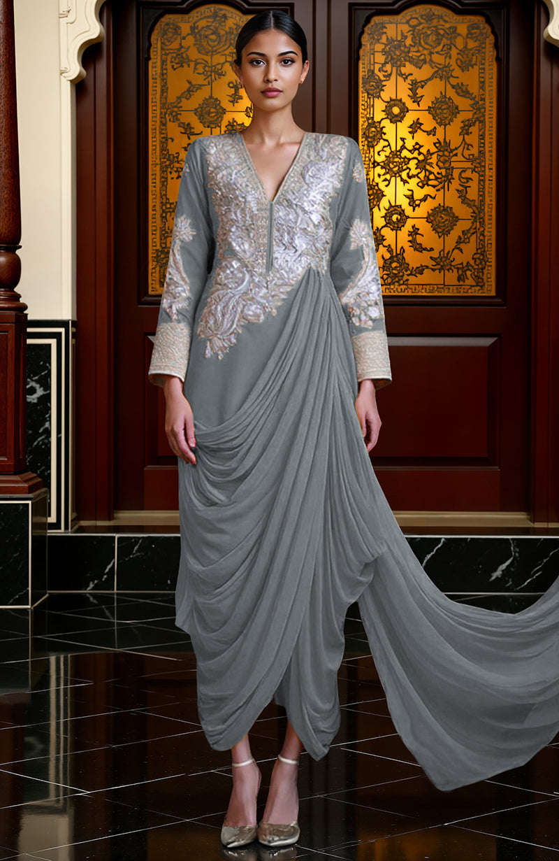 Mustard yellow draped skirt set with silver embroidery, deep V-neck, and detachable train.