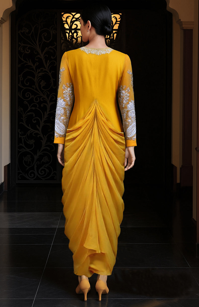 Mustard draped skirt set with silver tilla and white thread embroidery and detachable train.