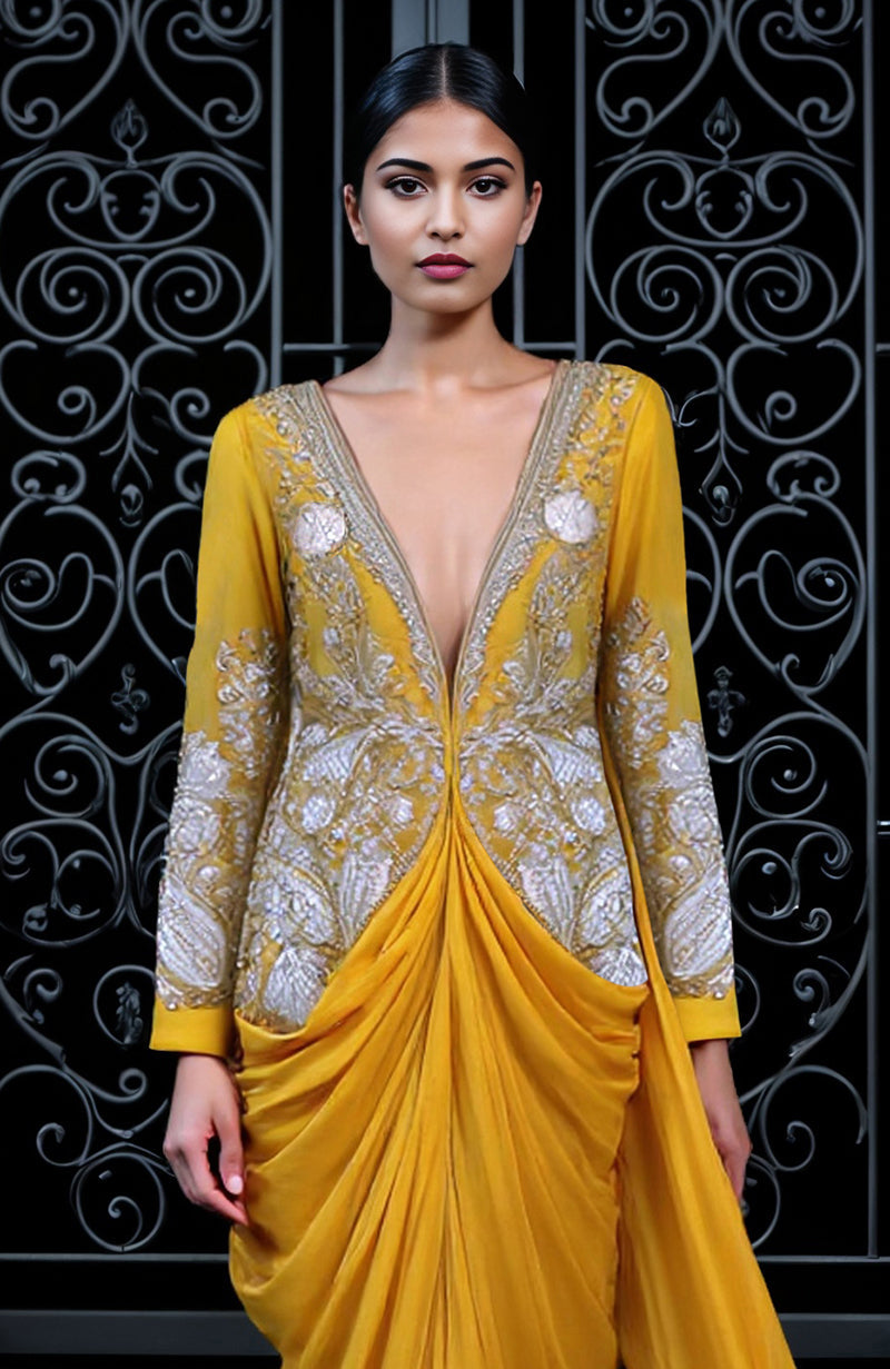 Mustard draped skirt set with silver tilla and white thread embroidery and detachable train