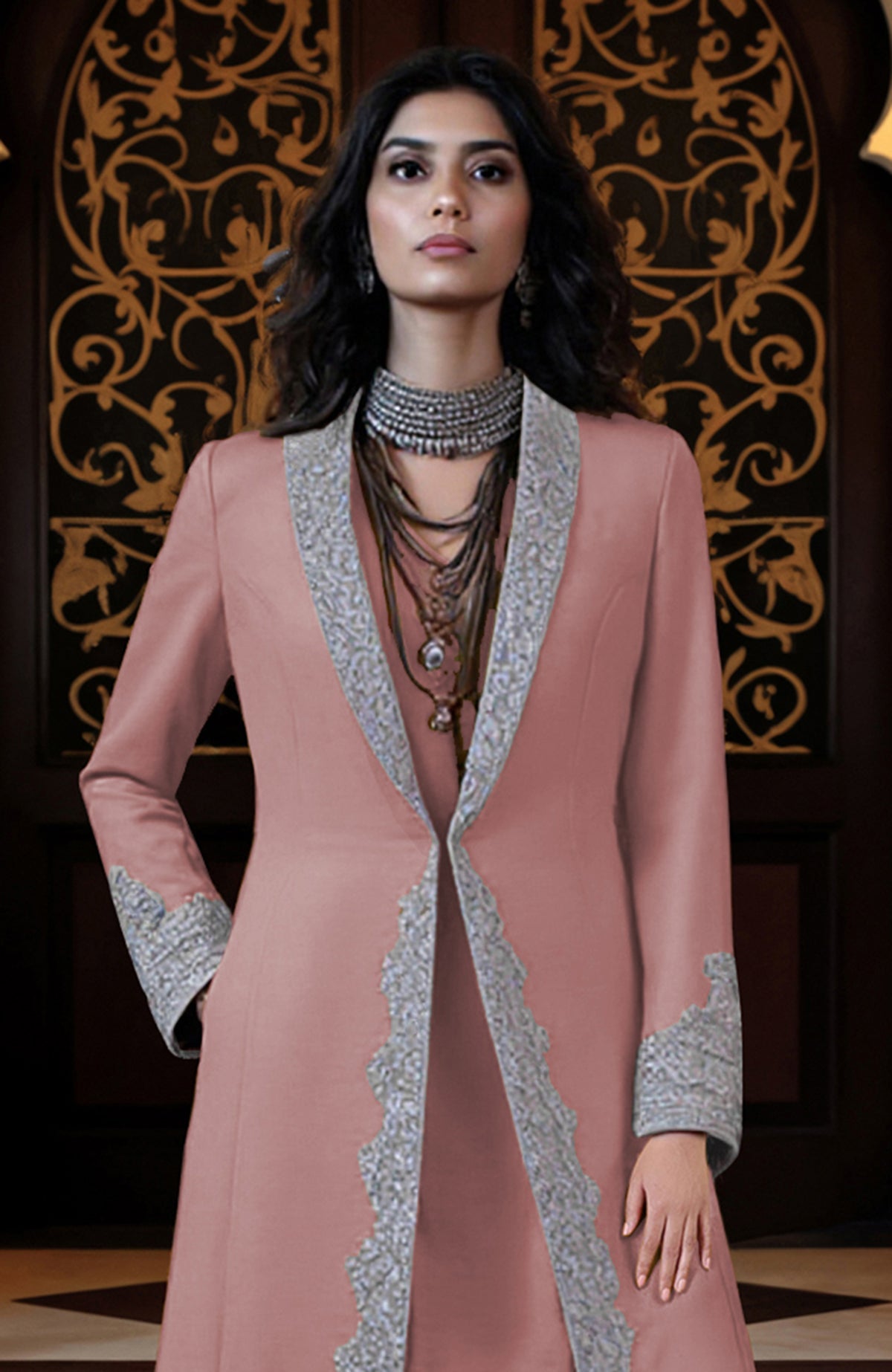 Silver embroidered longline jacket paired with matching tunic and draped dhoti pants set