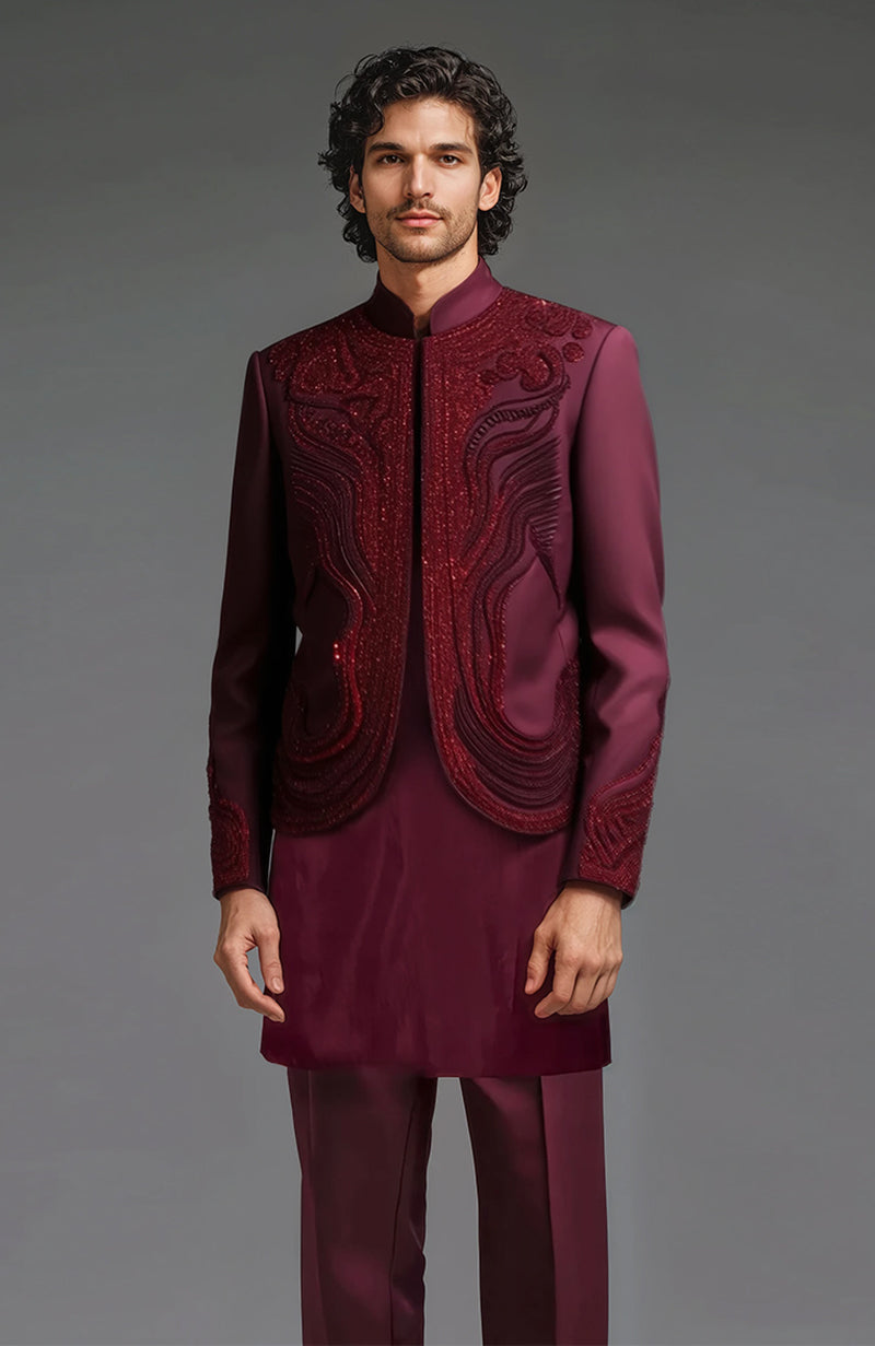 Deep burgundy embroidered jacket with mandarin collar, kurta, and tailored trousers set.