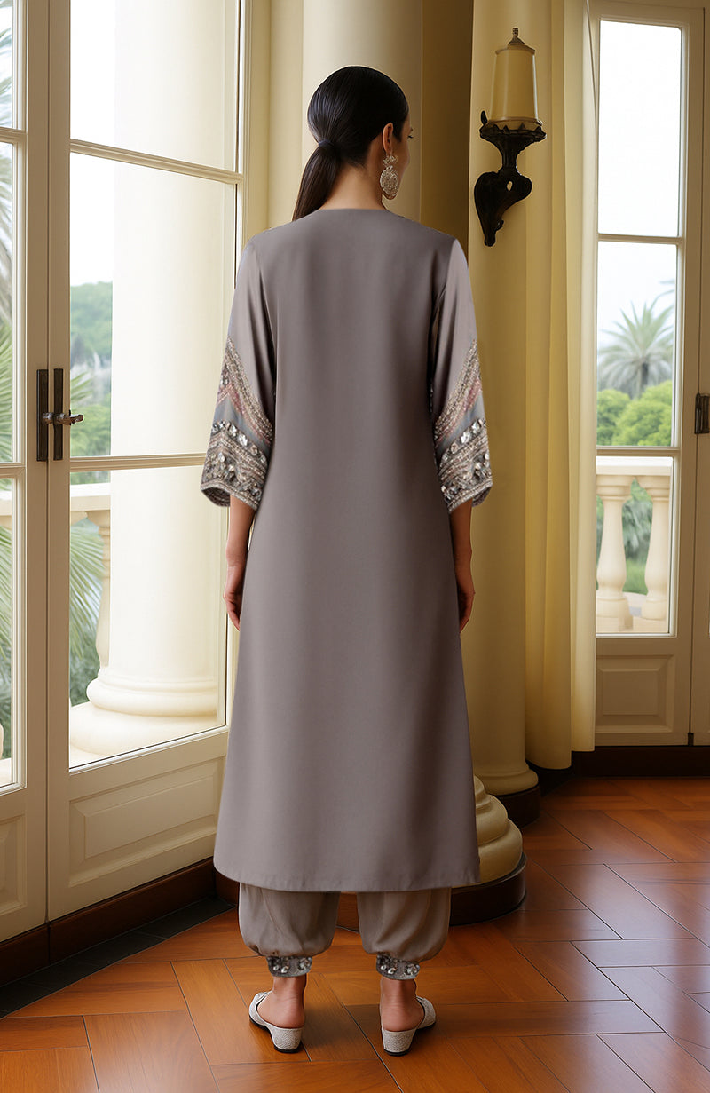 Taupe grey kurta with bead and mirror embroidery paired with matching tapered embroidered pants