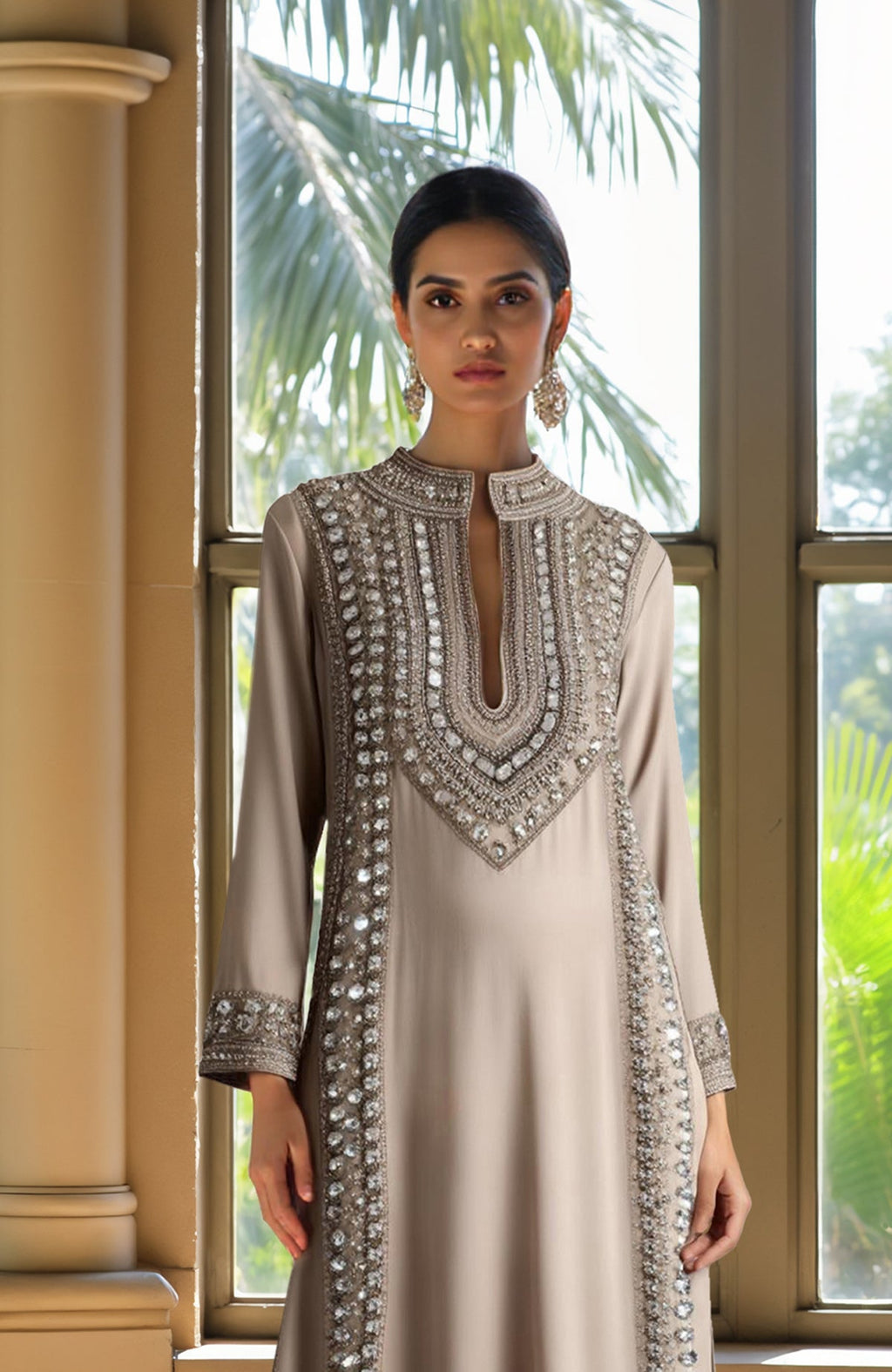 Champagne kurta set with bead and crystal embroidery, long sleeves, and cropped embellished trousers.