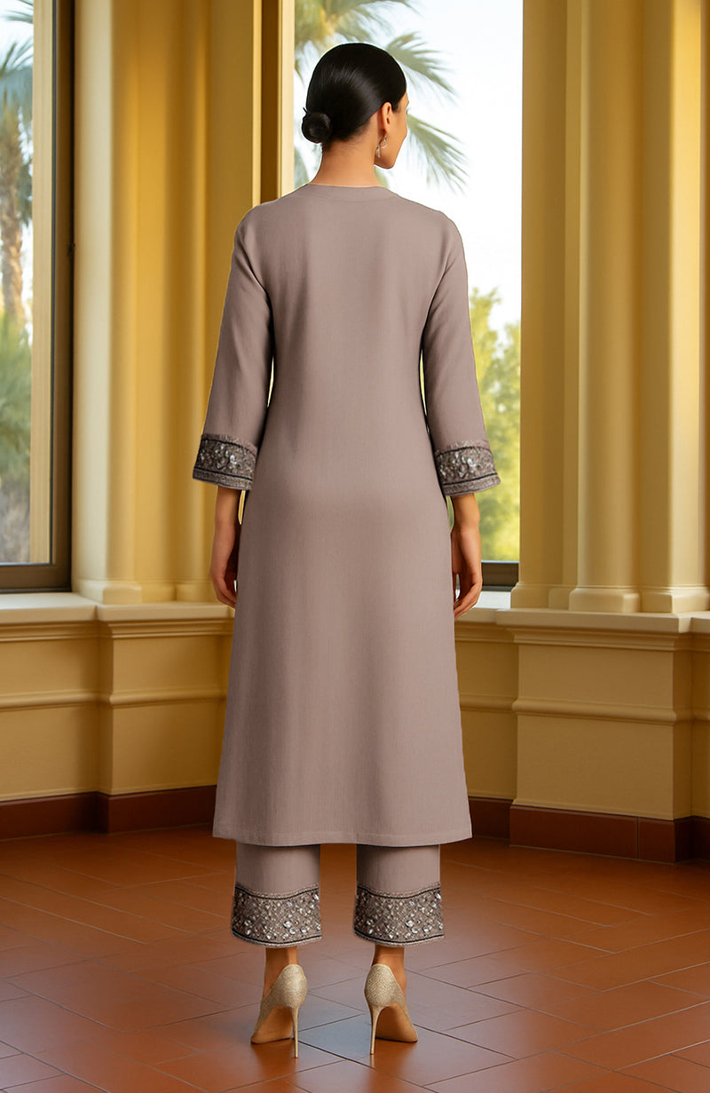 Taupe beige kurta set with bead and crystal embroidery, keyhole neckline, and cropped trousers.