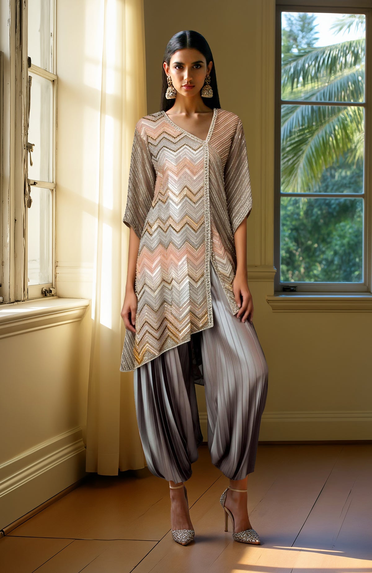Grey tunic with bead and sequin embroidery paired with draped silver-gray harem pants.