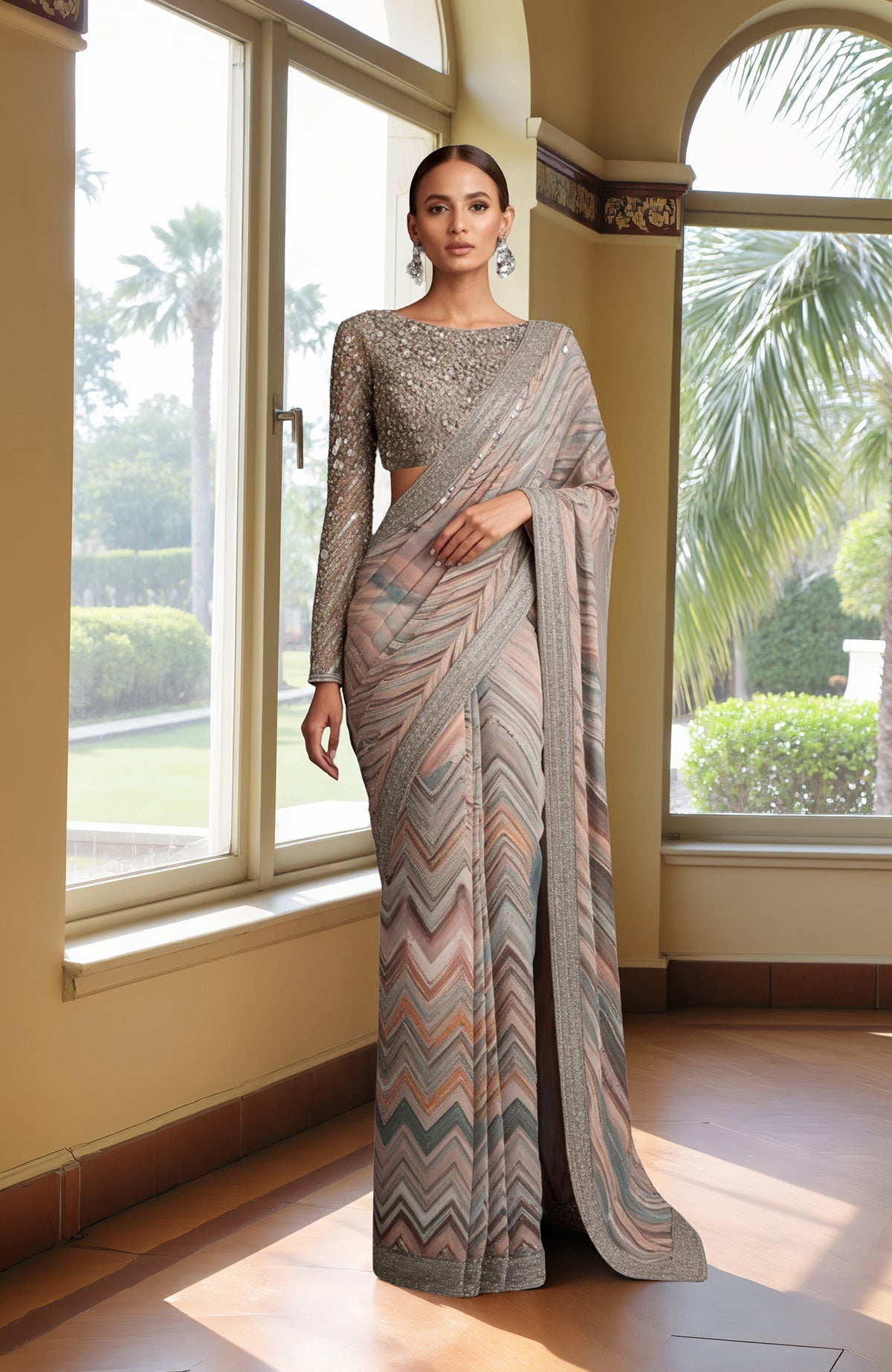 Pastel saree with chevron print, silver sequin and bead embroidery, and a silver sequin blouse.