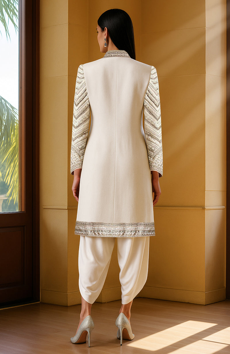 Ivory jacket with bead and sequin embroidery in chevron pattern, paired with cropped blouse and dhoti pants