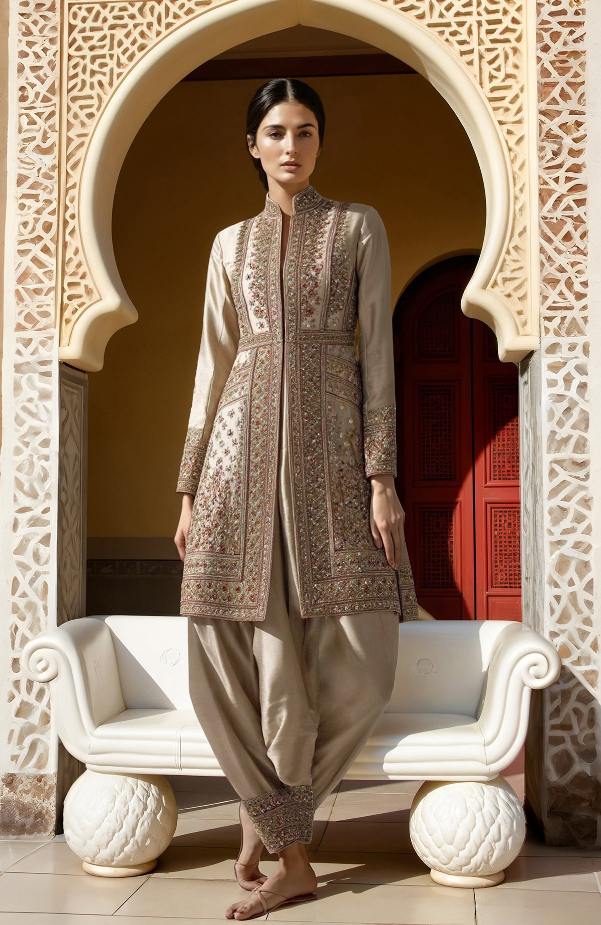 Ivory long jacket with floral embroidery and draped salwar with embroidered cuffs set