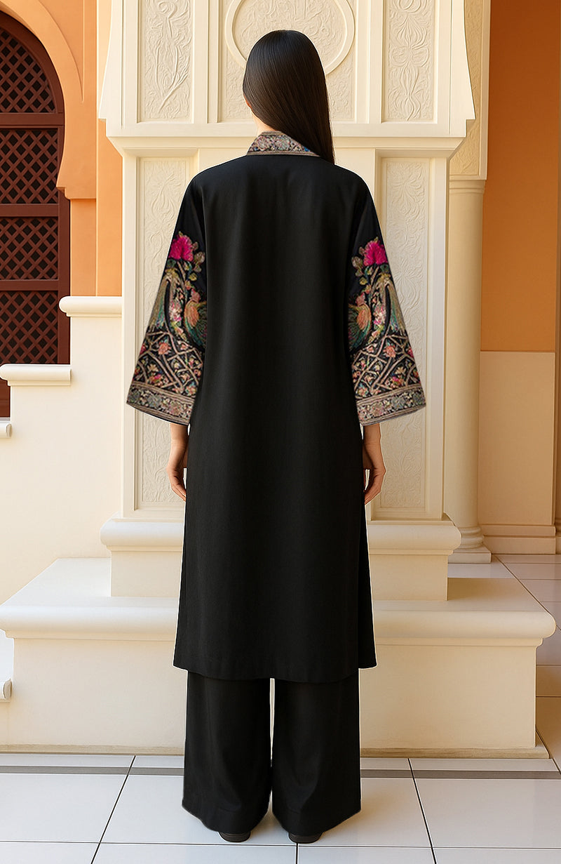 Black kimono jacket with gold, pink, green, and blue floral and bird embroidery and wide sleeves