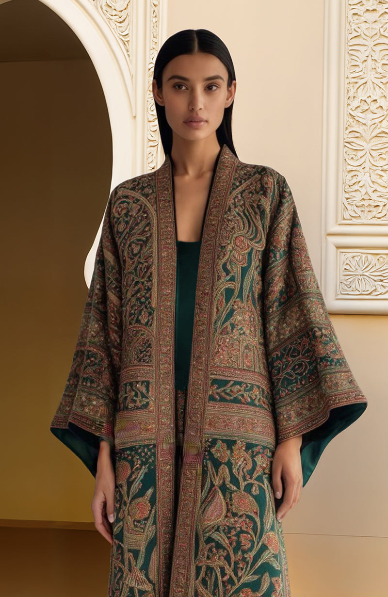 Emerald green embroidered kimono jacket with wide sleeves paired with matching trousers and crop top