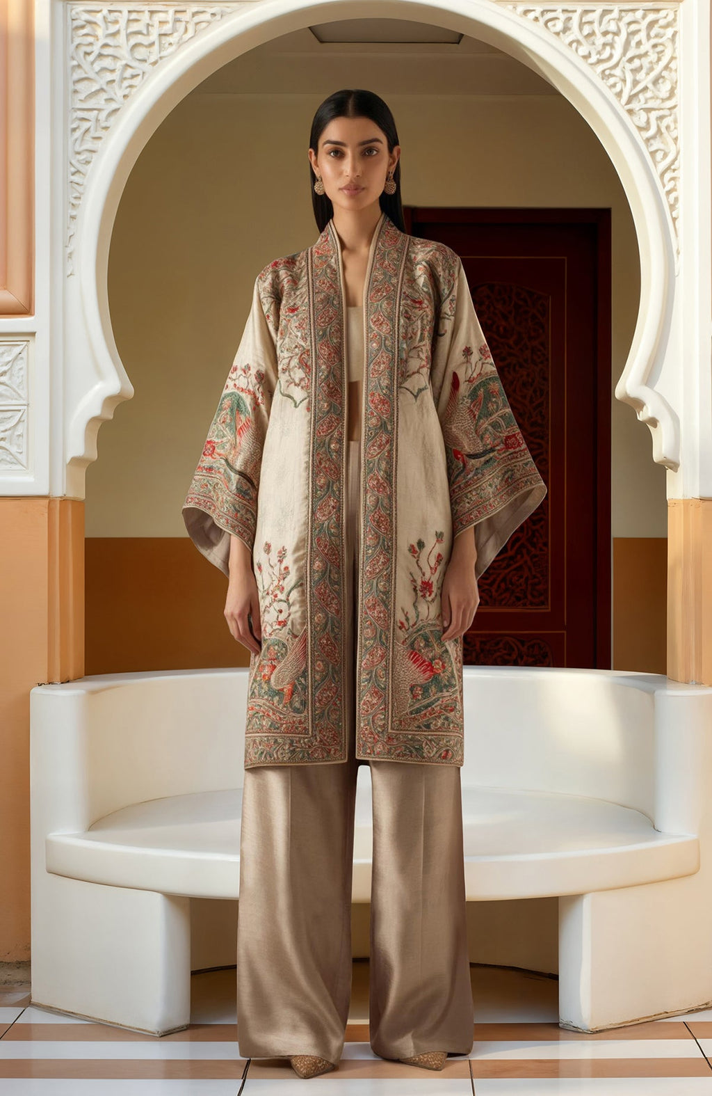 Ivory kimono jacket set with embroidered floral motifs in red, green, and gold, wide sleeves.