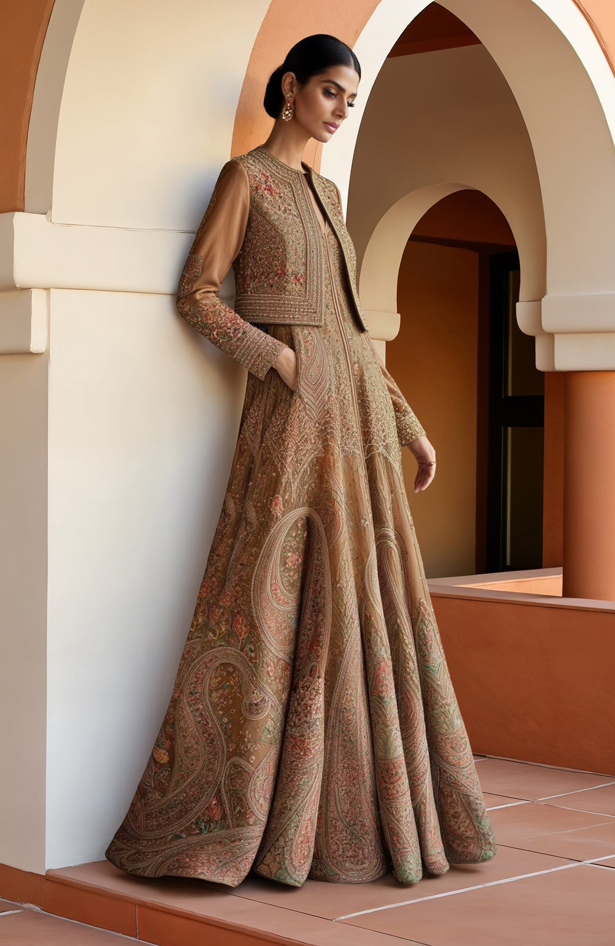 Earthy brown Anarkali gown with paisley embroidery paired with a cropped jacket with full sleeves