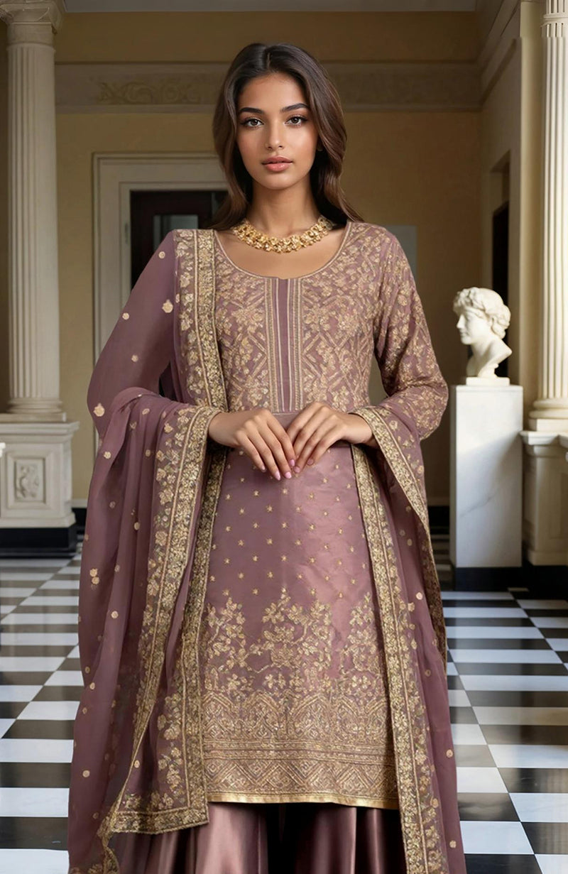 Dusty mauve gharara set with gold embroidery, short kurti, flared pants, and sheer dupatta.