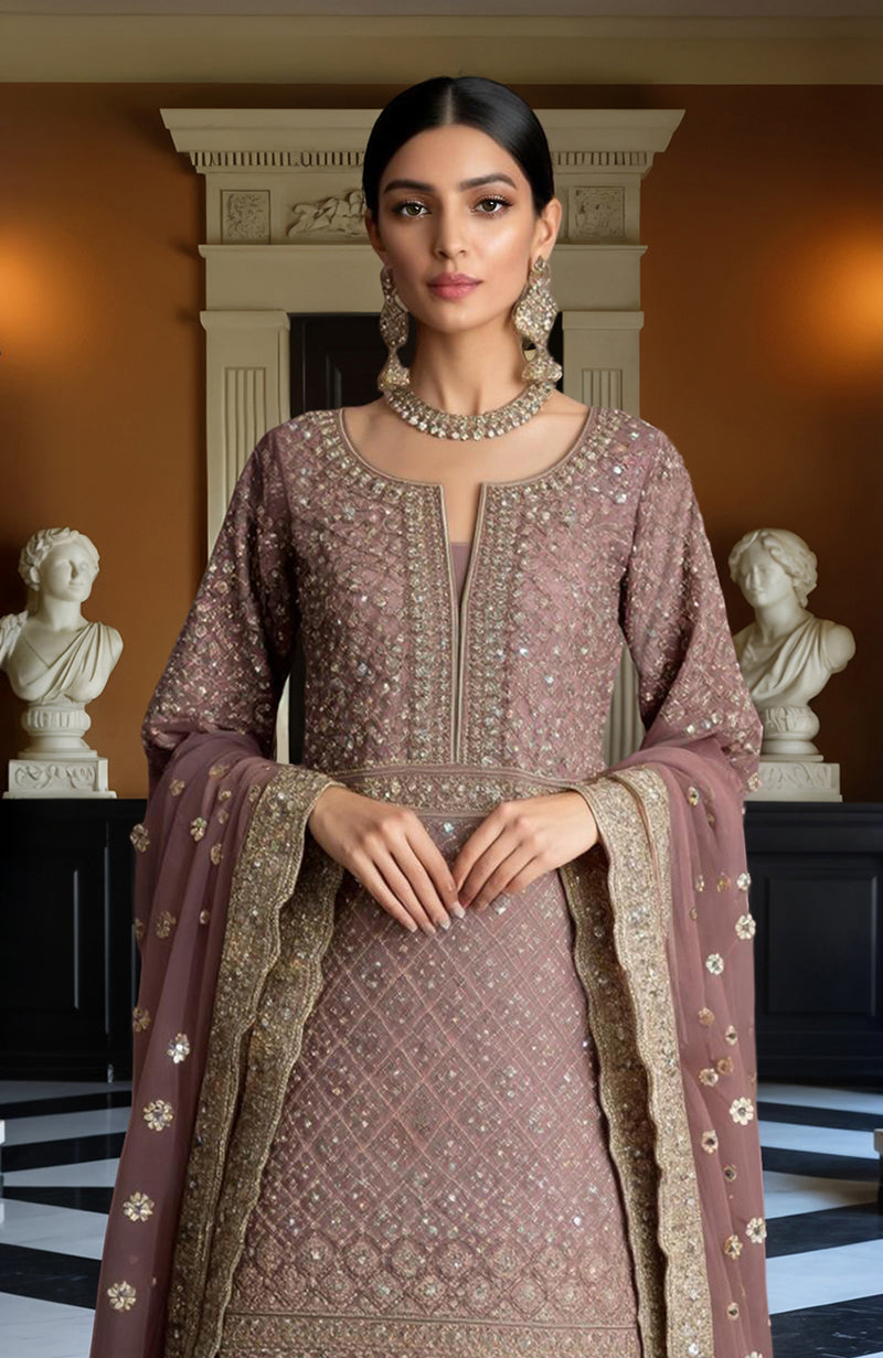 Dusty mauve sharara set with gold embroidery on kurti, flared pants, and sheer dupatta.