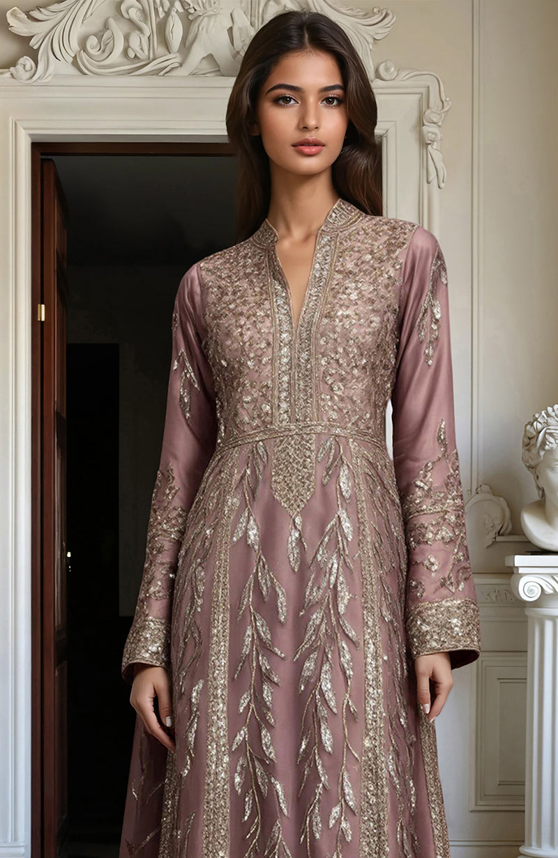 Muted mauve embroidered kurta set with gold floral details, sheer sleeves, straight pants, and dupatta.