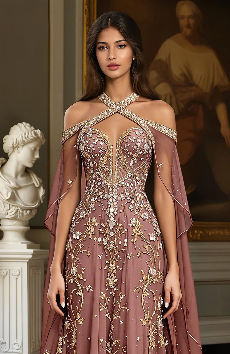 Dusty mauve floor-length gown with gold embroidery and sheer cape-like draped sleeves.