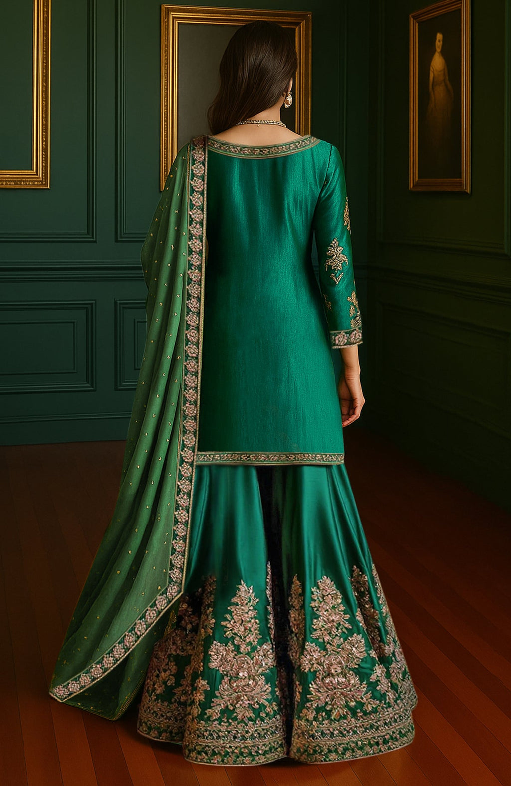 Emerald green gharara set with gold floral embroidery on kameez, sharara pants, and sheer dupatta