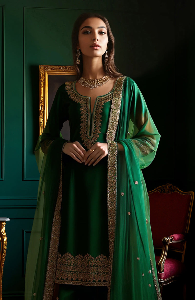 Emerald green gharara set with gold floral embroidery on tunic, pants, and sheer dupatta.