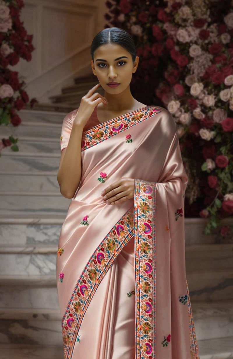 Blush pink saree with intricate Kashidakari floral embroidery on border and pallu.