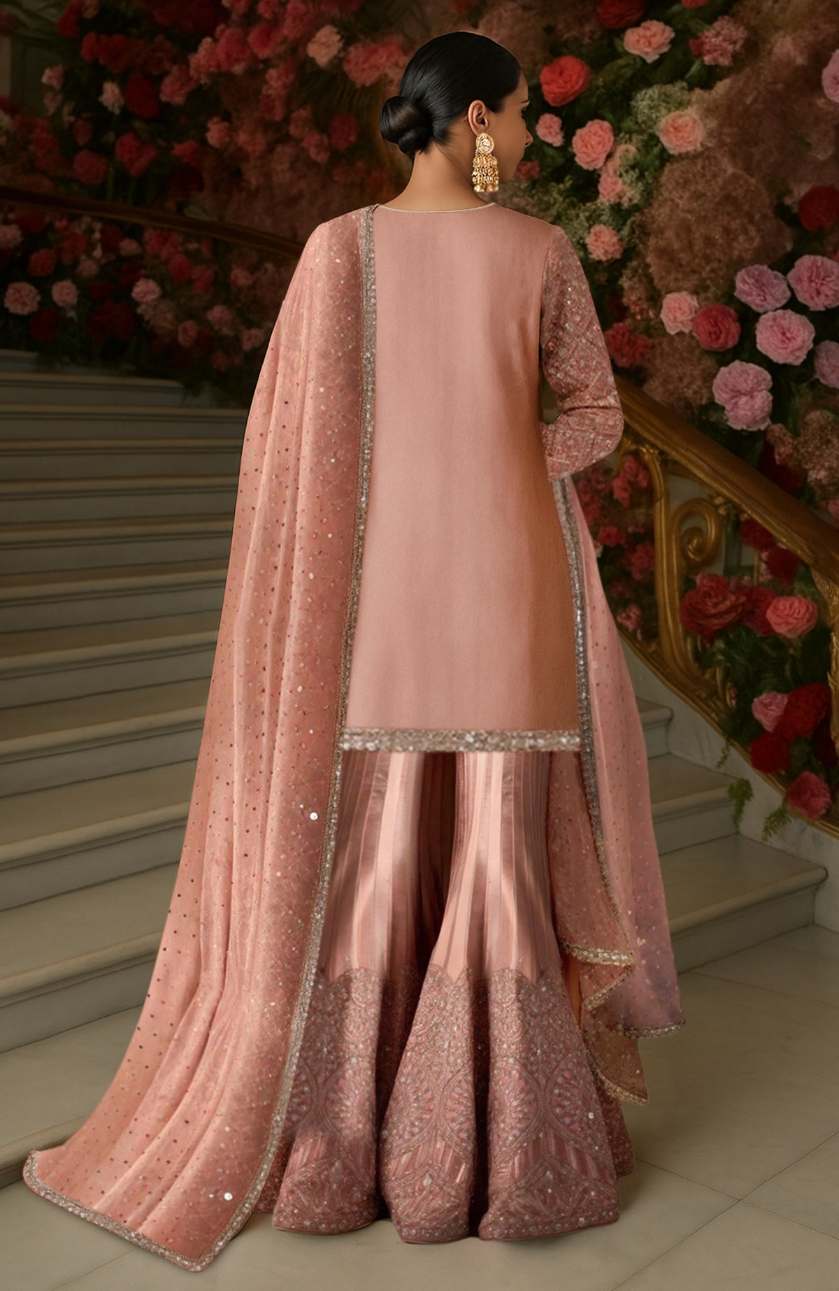 Blush pink sharara set with sequin embroidery, geometric patterns, flared pants, and sheer dupatta.