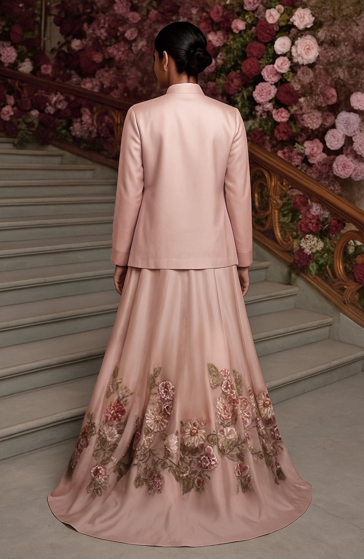 Blush pink embroidered skirt set with rose gold crop top and matching open-front jacket.
