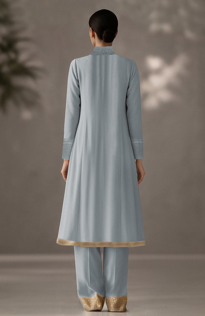 Powder blue embroidered kurta with pleated drape detail and matching straight trousers with gold trim