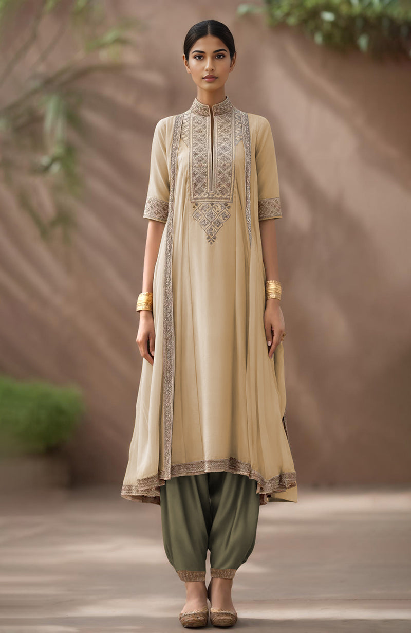 Taupe A-line kurta with metallic embroidery and attached side drapes paired with mocha salwar.