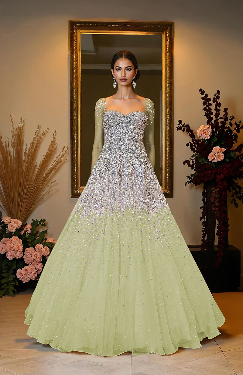 Ivory princess gown with hand-embroidered crystal and pearl beads on corset bodice and skirt.