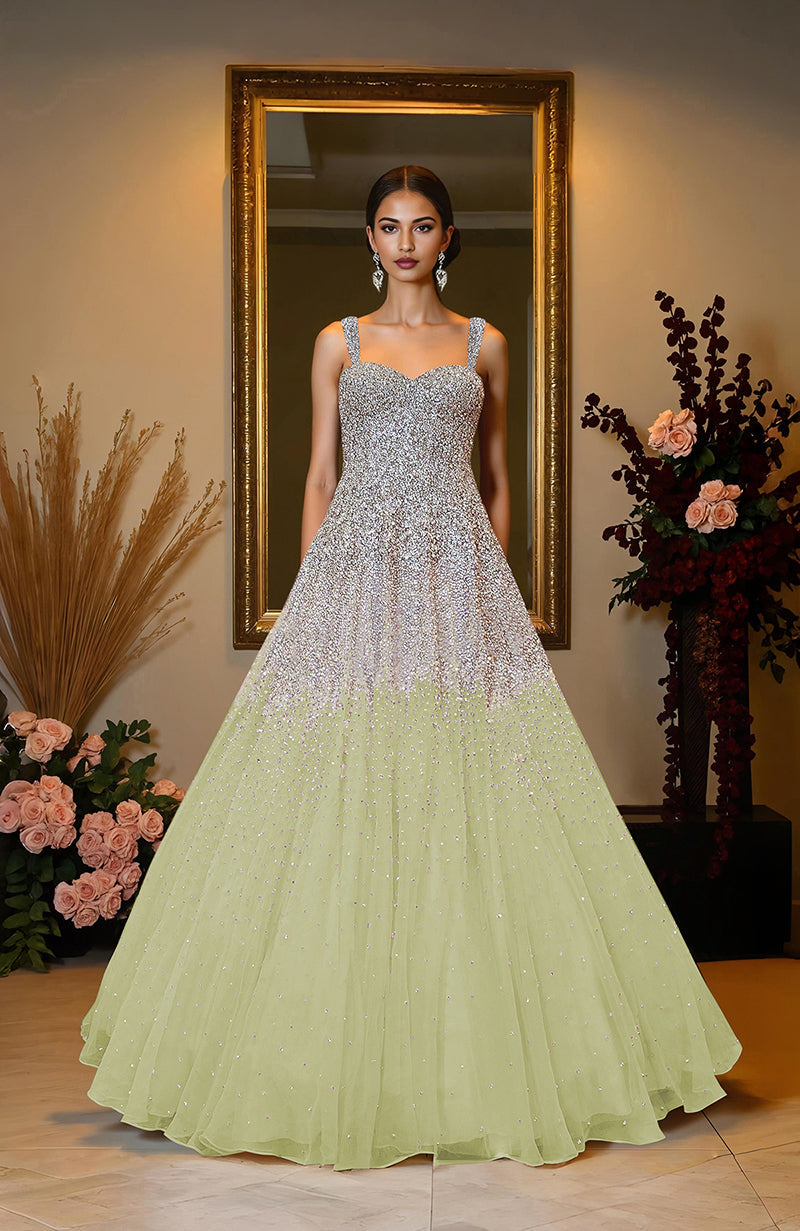 Ivory princess gown with hand-embroidered crystal and pearl bead bodice and voluminous skirt.