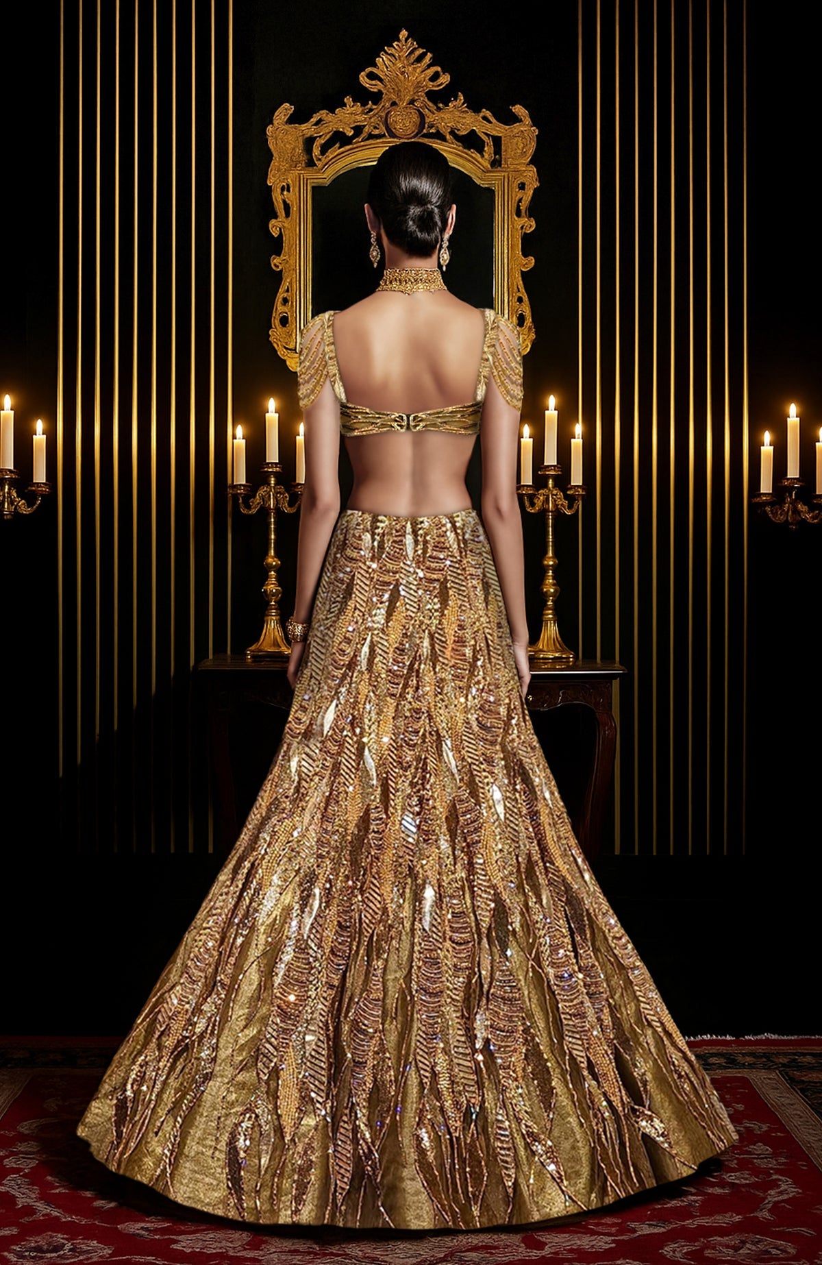 Gold hand-embroidered lehenga set with sculpted blouse and tulle cape with shimmer beading.