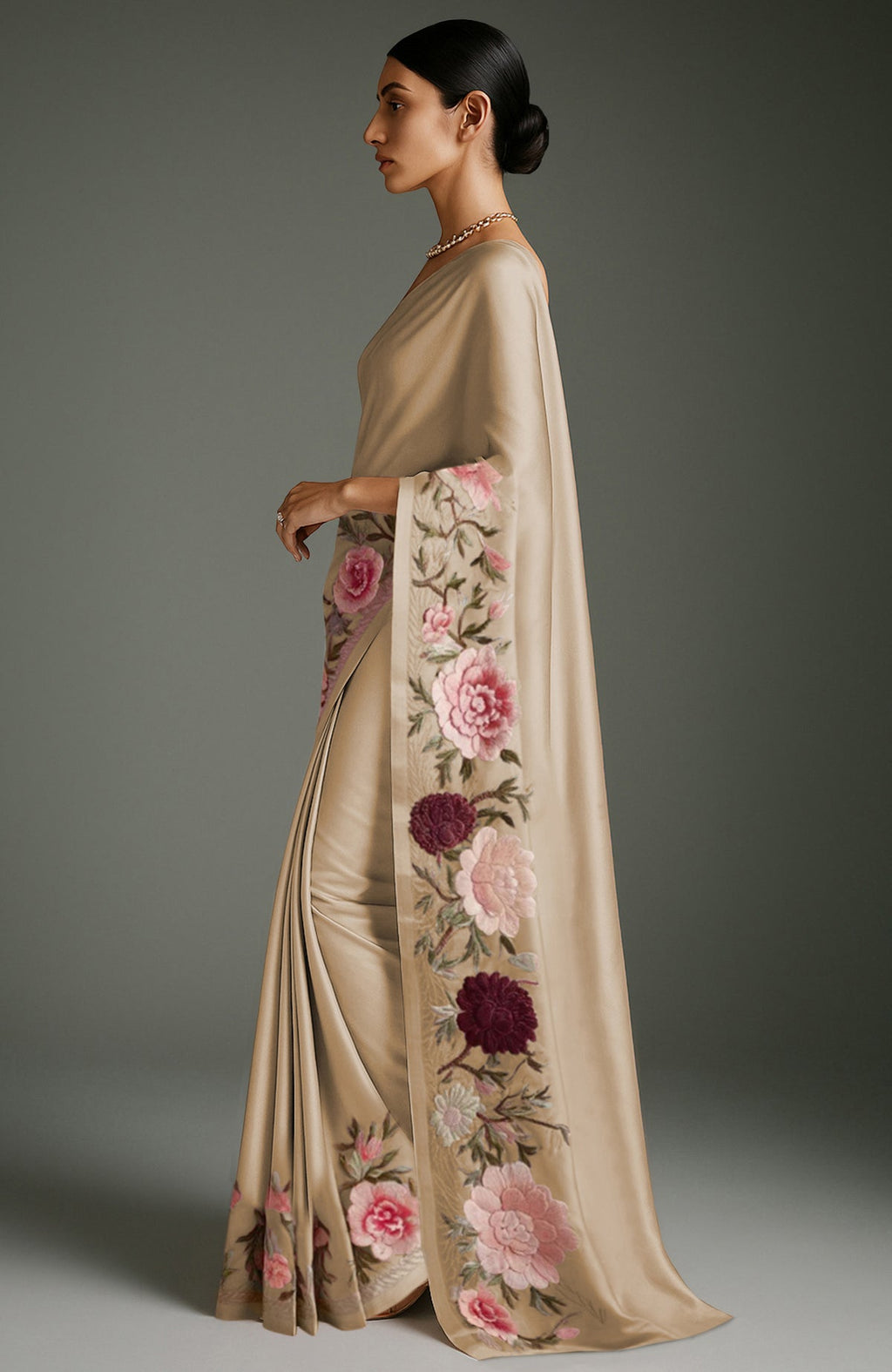Gold saree with embroidered peonies and roses in pink, burgundy, ivory, and green tones.