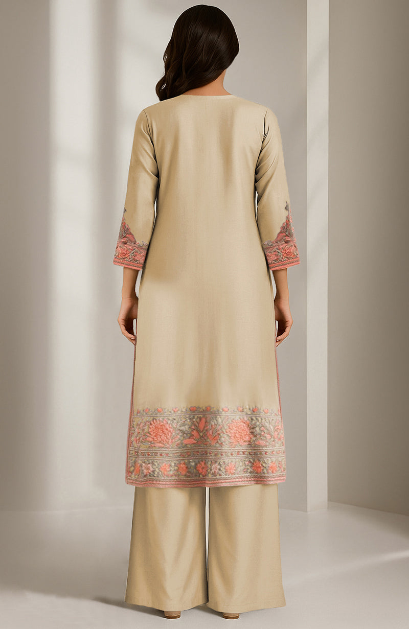 Pale gold knee-length kurta with peach and sage floral embroidery and wide-legged palazzo pants.