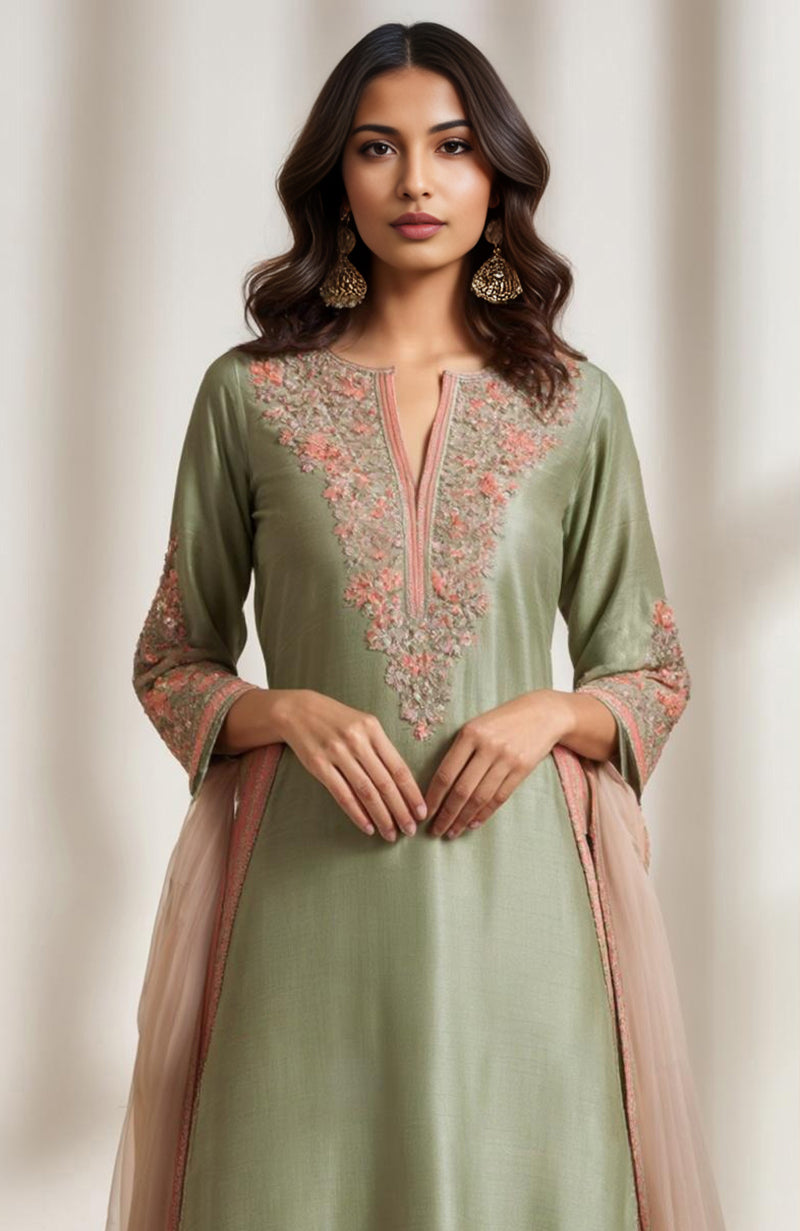 Sage green kurta set with salmon peach and gold floral embroidery and wide-leg trousers