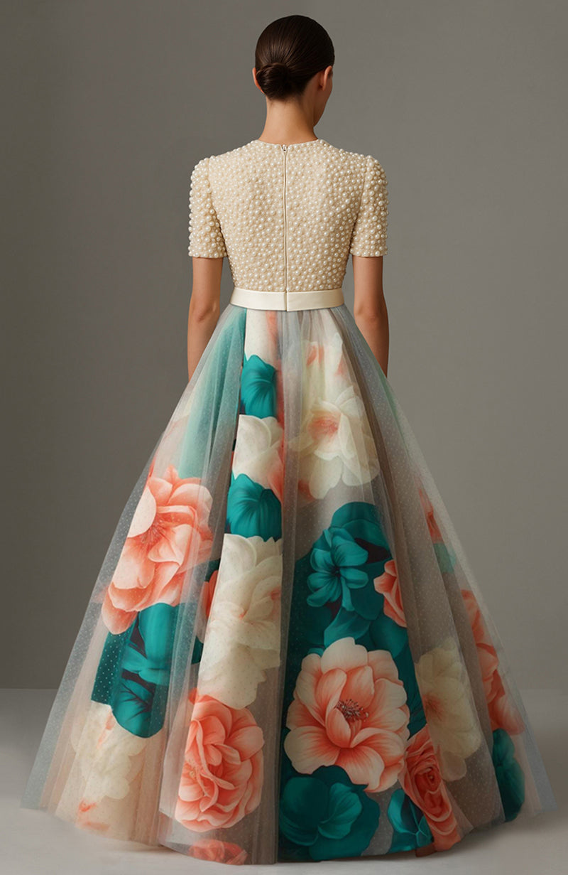 Ivory pearl-embroidered short-sleeve top paired with a floral print sheer A-line skirt set.