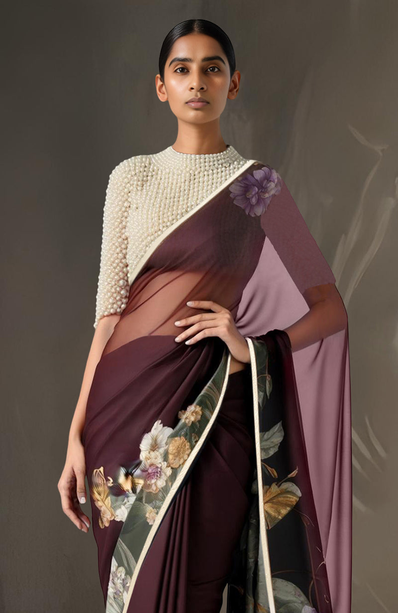 Deep wine chiffon saree with floral prints paired with ivory pearl-embroidered blouse.