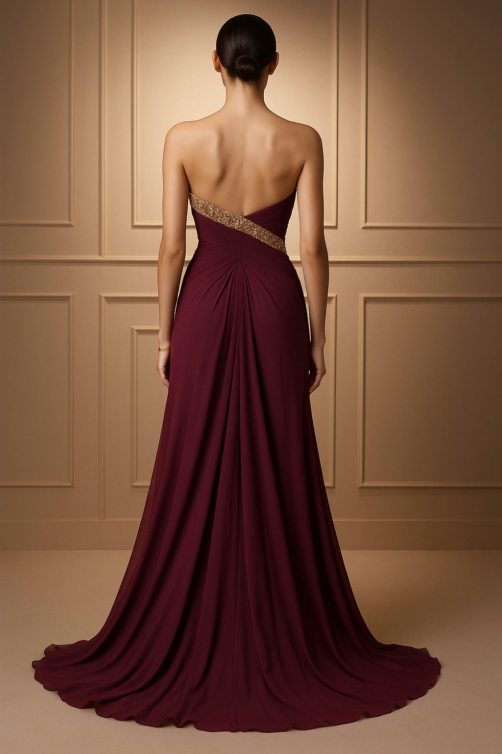 Strapless crimson gown with sweetheart neckline and gold crystal embroidery on bust and waist.