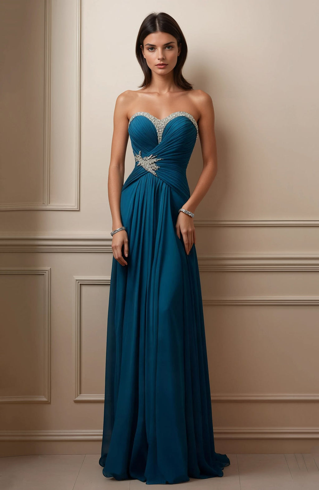 Strapless teal gown with crystal sweetheart neckline and pleated bodice flowing into a floor-length skirt