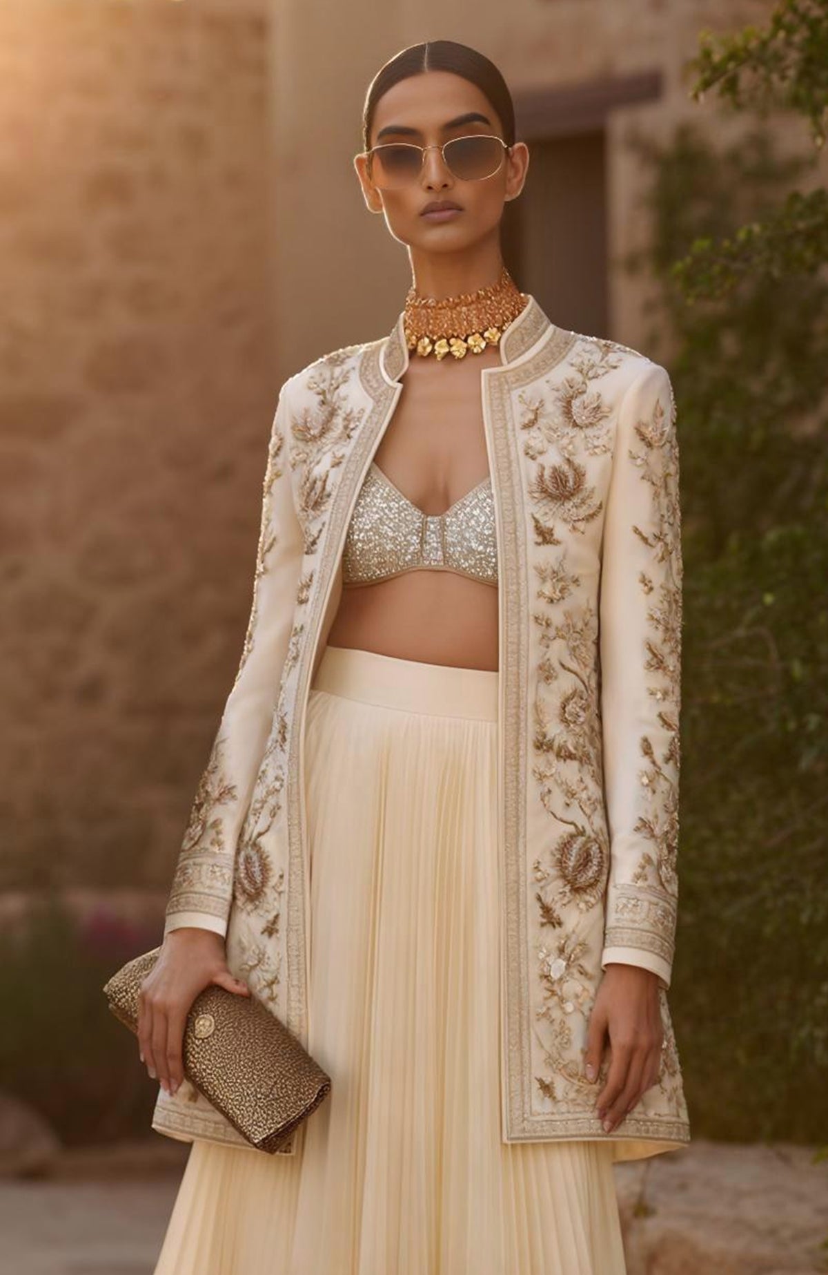 Ivory gold long embroidered jacket with crystal bralette and pleated georgette skirt set