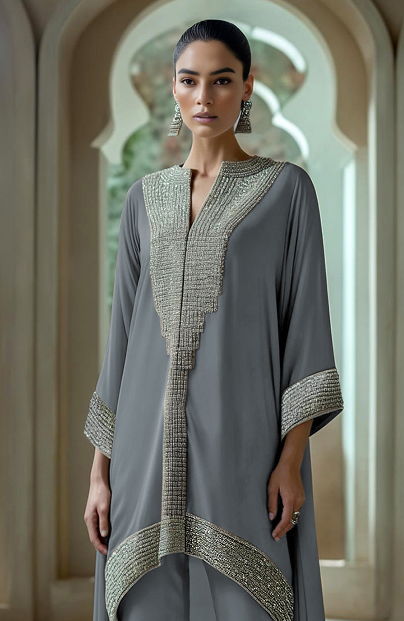 Slate grey asymmetric kurta set with intricate bead and crystal embroidery and wide cuffs