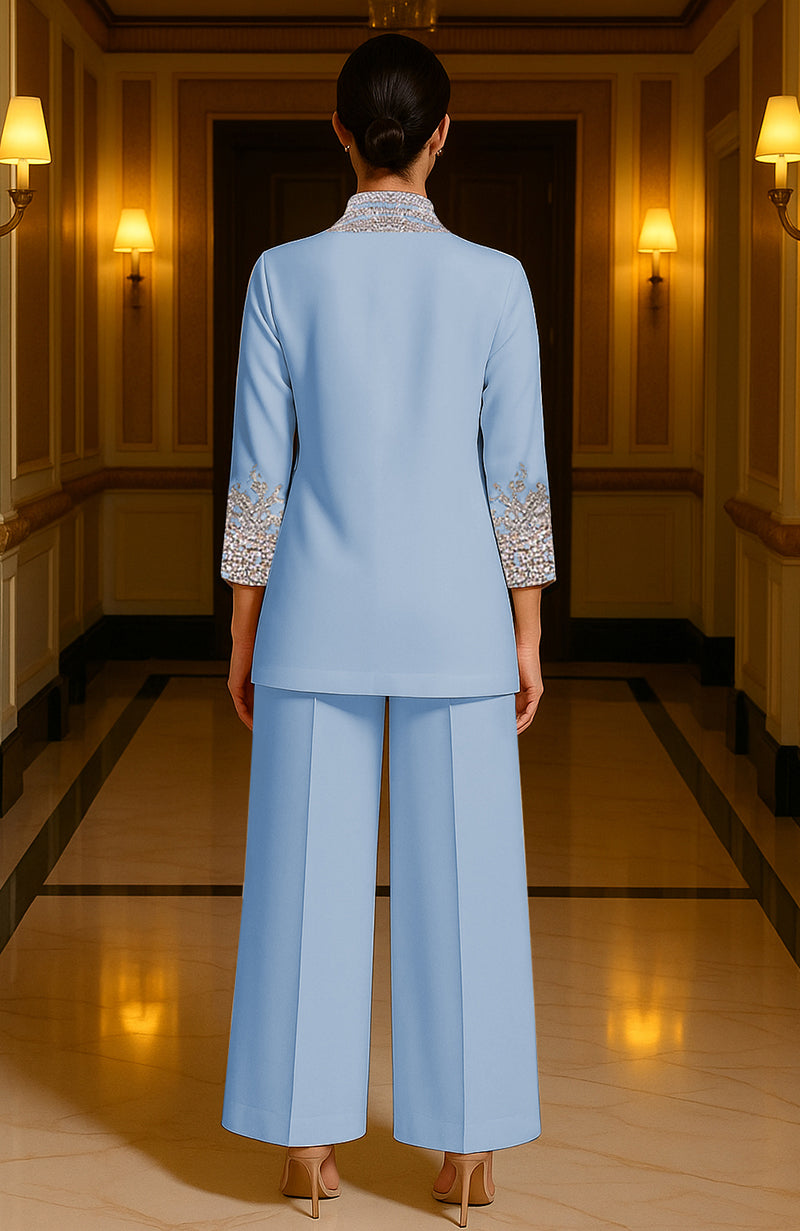 Cerulean blue two-piece ensemble with crystal embroidery, silver and gold accents, and sapphire stones.