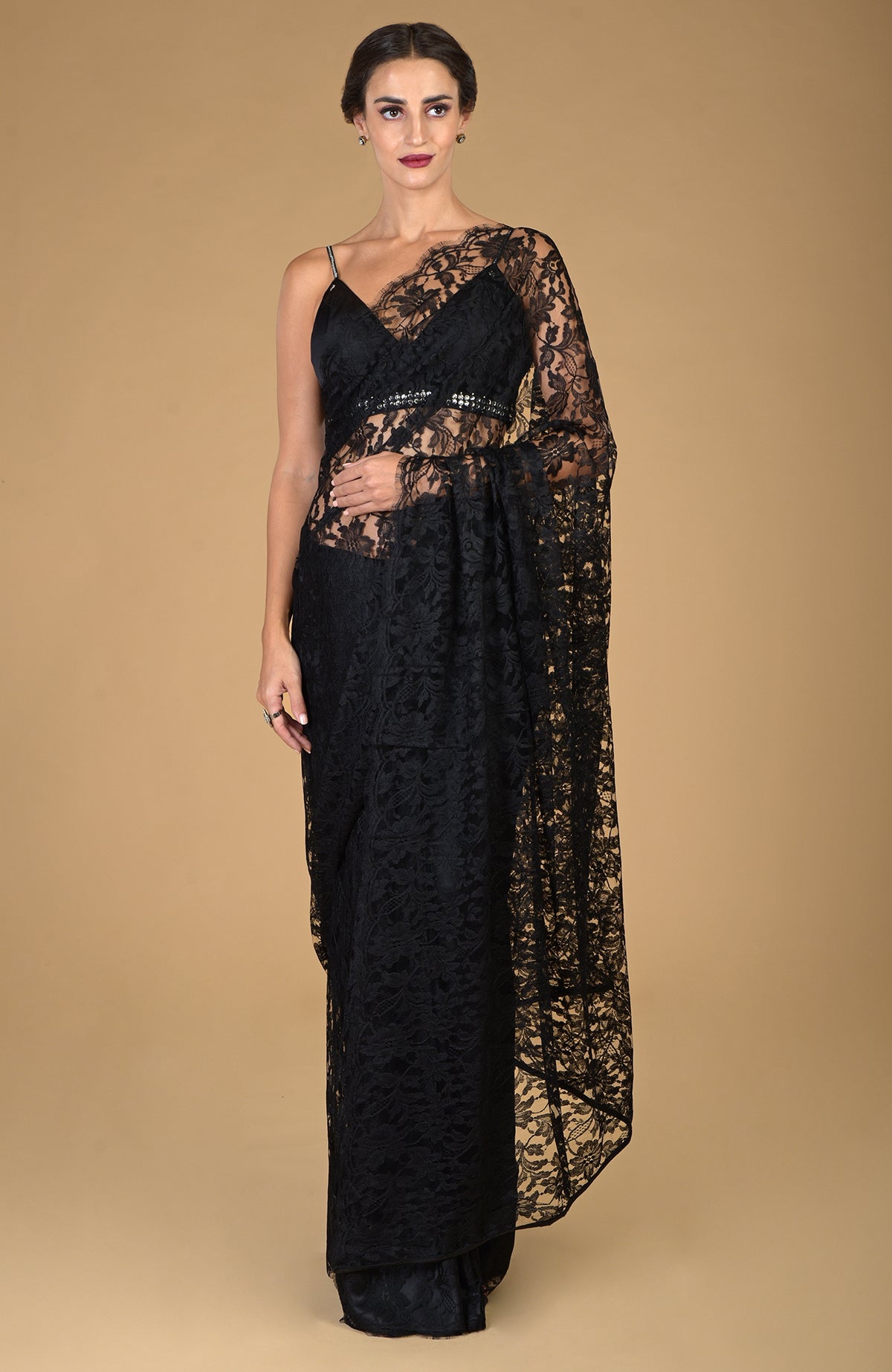 Black French Chantilly lace saree with an embellished blouse.