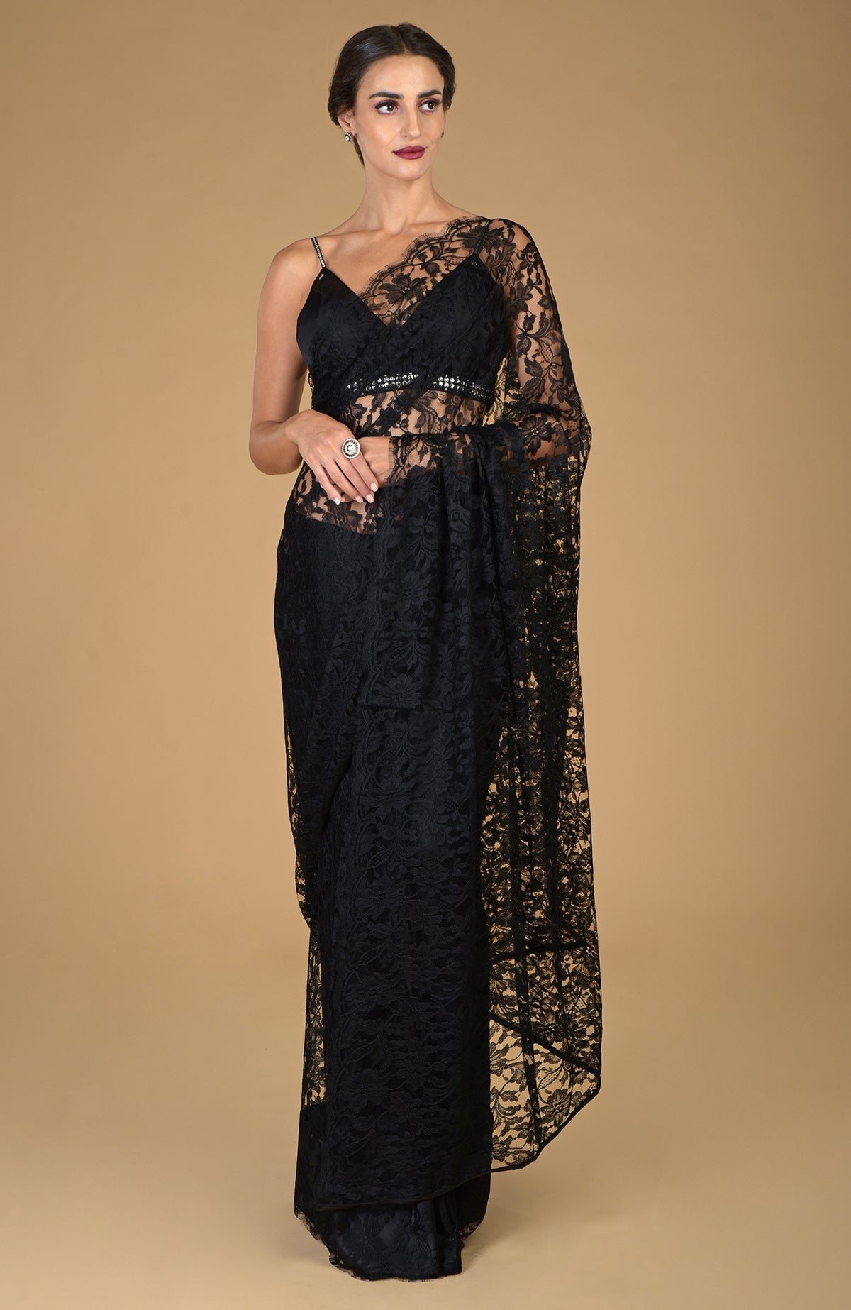 Black French Chantilly lace saree with an embellished blouse.
