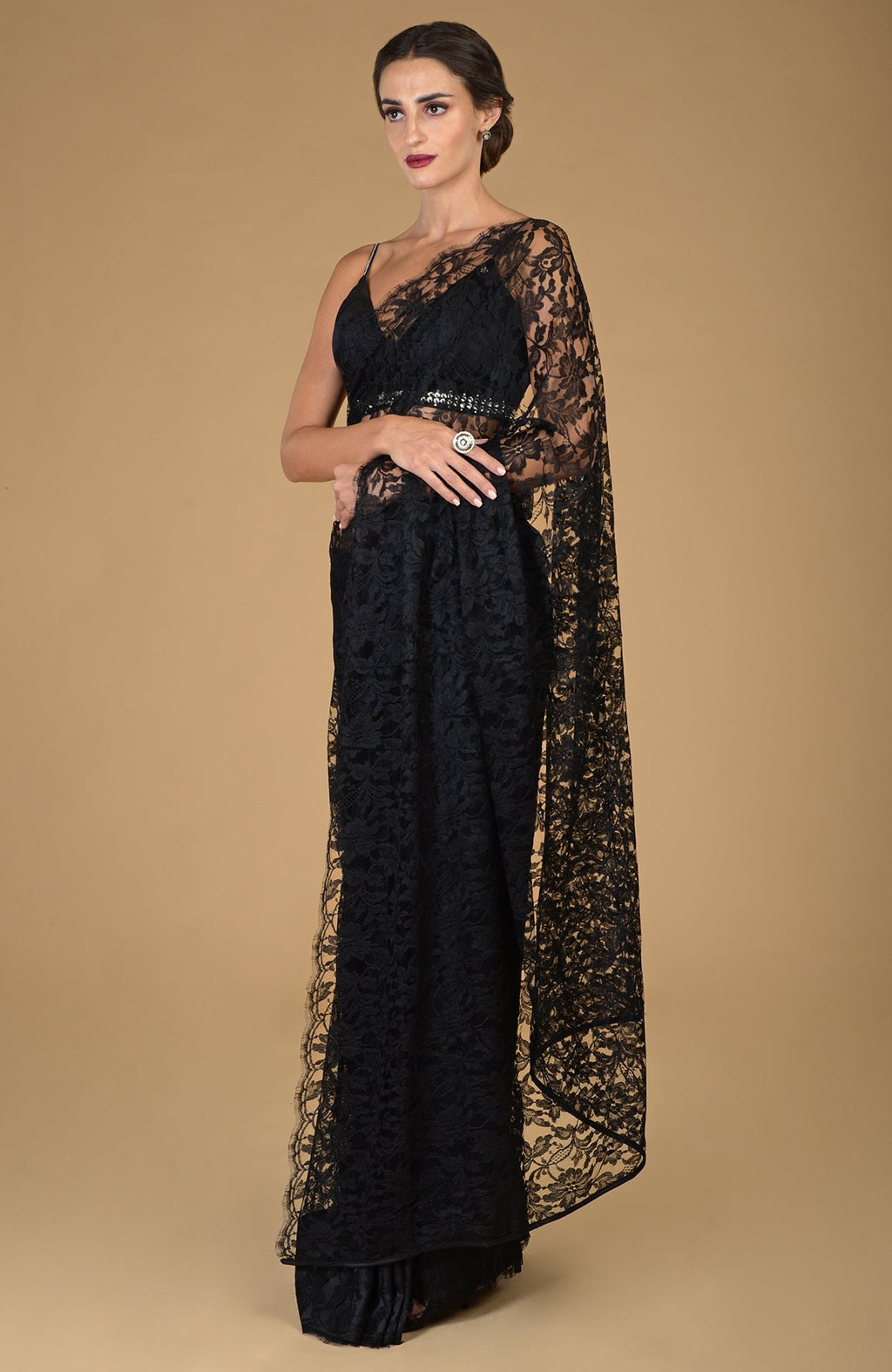 Black French Chantilly lace saree with an embellished blouse.