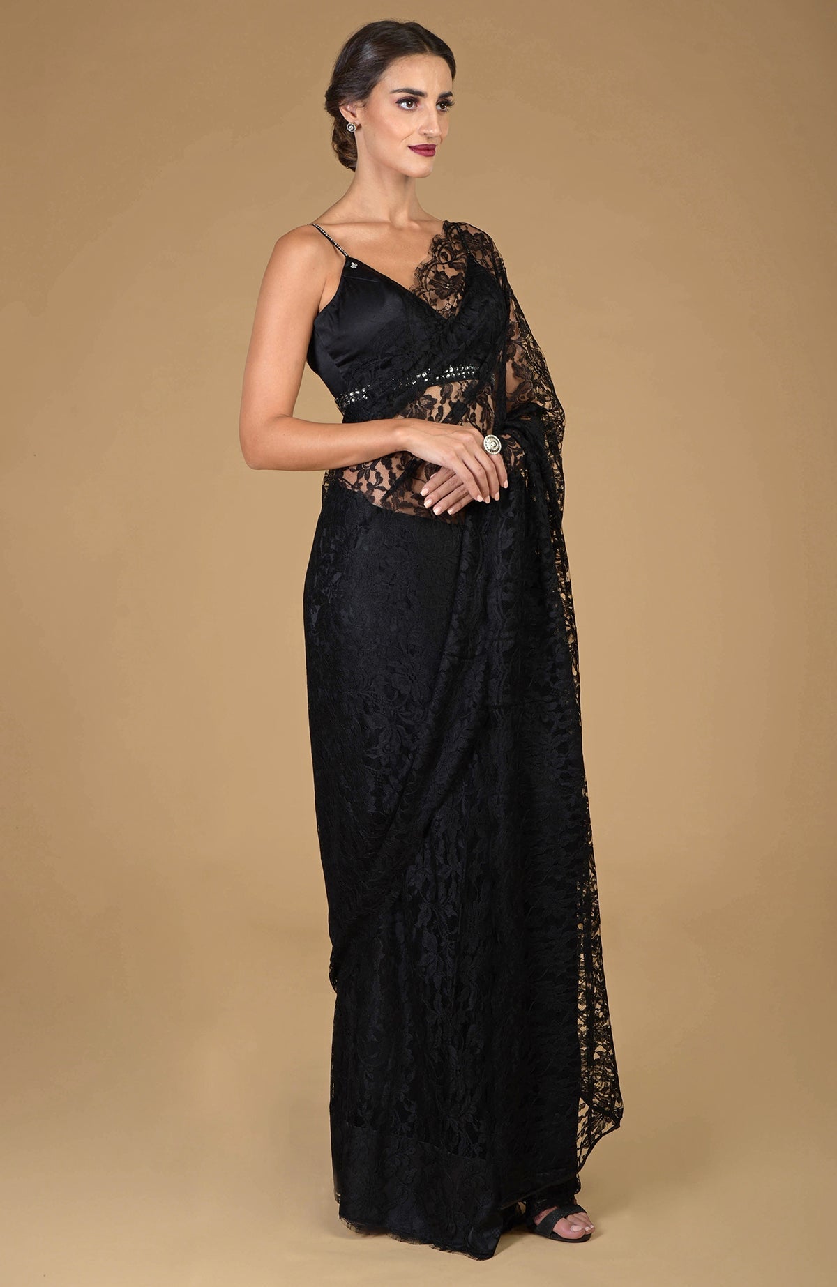 Black French Chantilly lace saree with an embellished blouse.