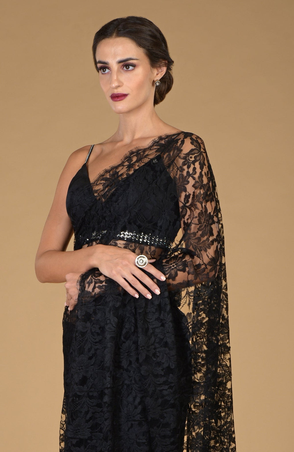Black French Chantilly lace saree with an embellished blouse.