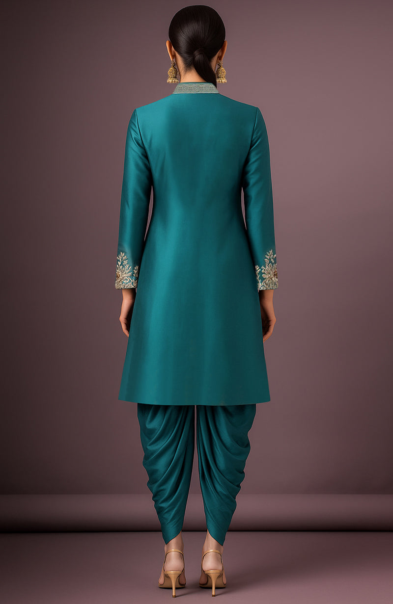 Teal silk jacket set with high collar, gold buttons, and floral hand embroidery paired with ruched pants