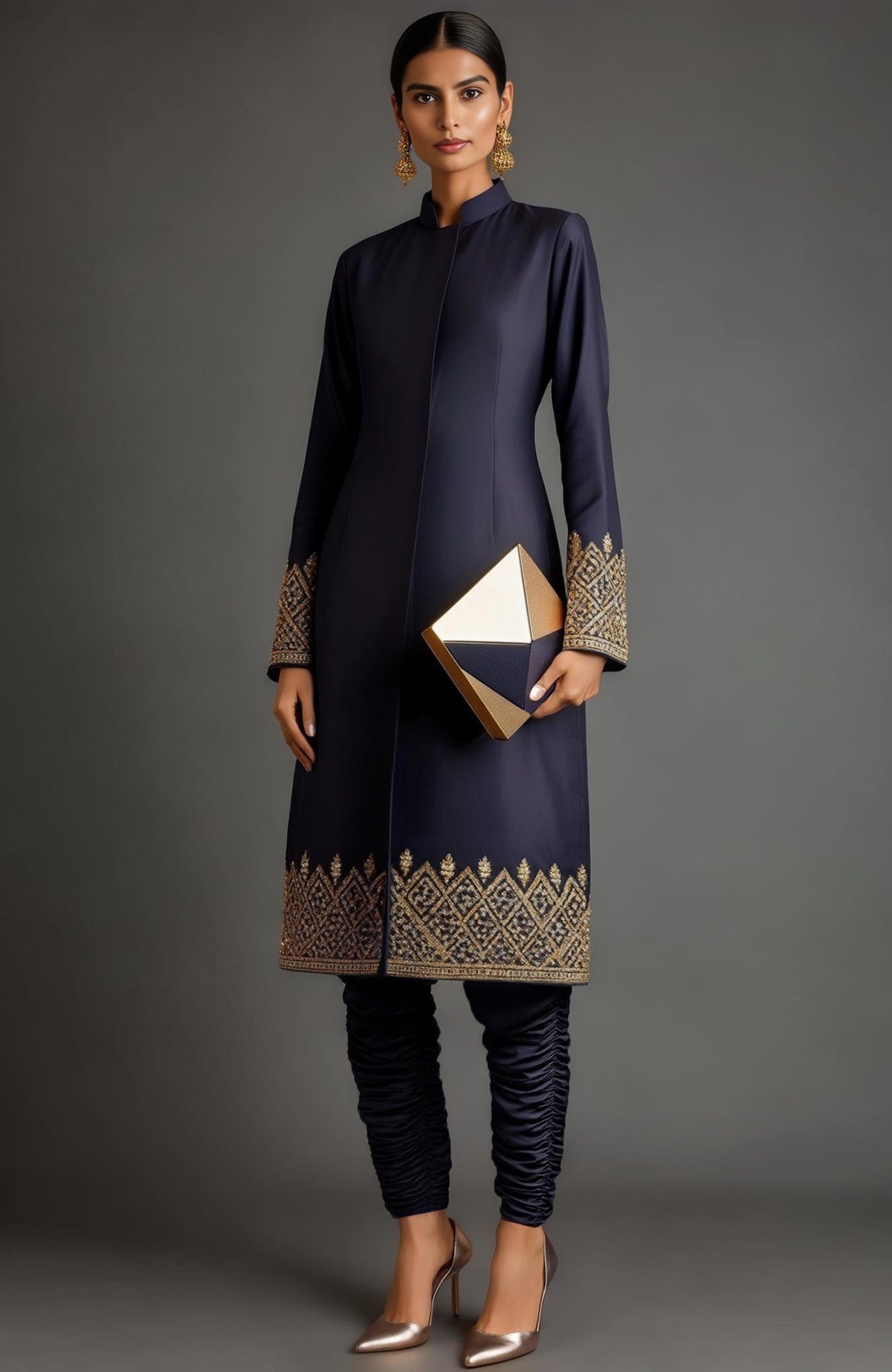 Midnight navy silk sherwani jacket with gold zardozi embroidery and ruched churidar trousers.
